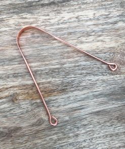 Gratte-langue en cuivre